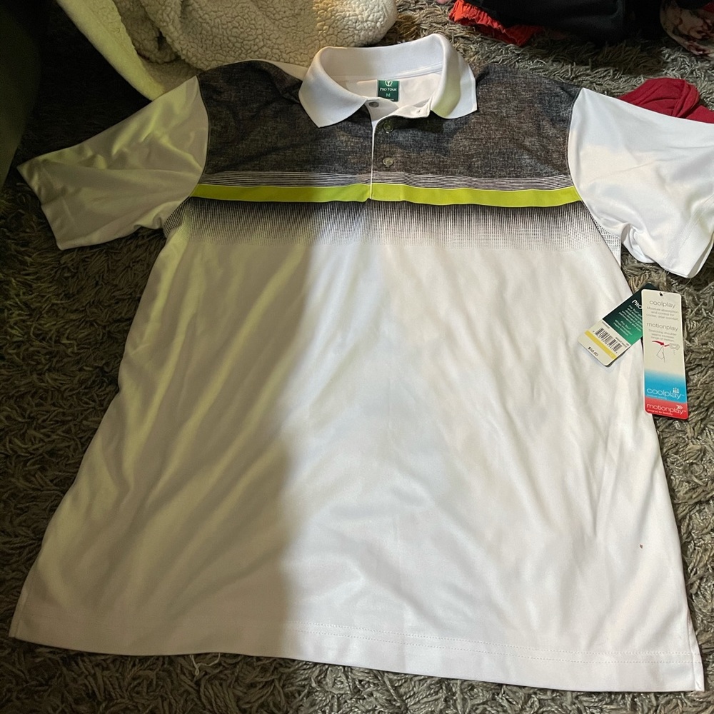 Men’s Pro Tour polo. Size Medium. New with tag